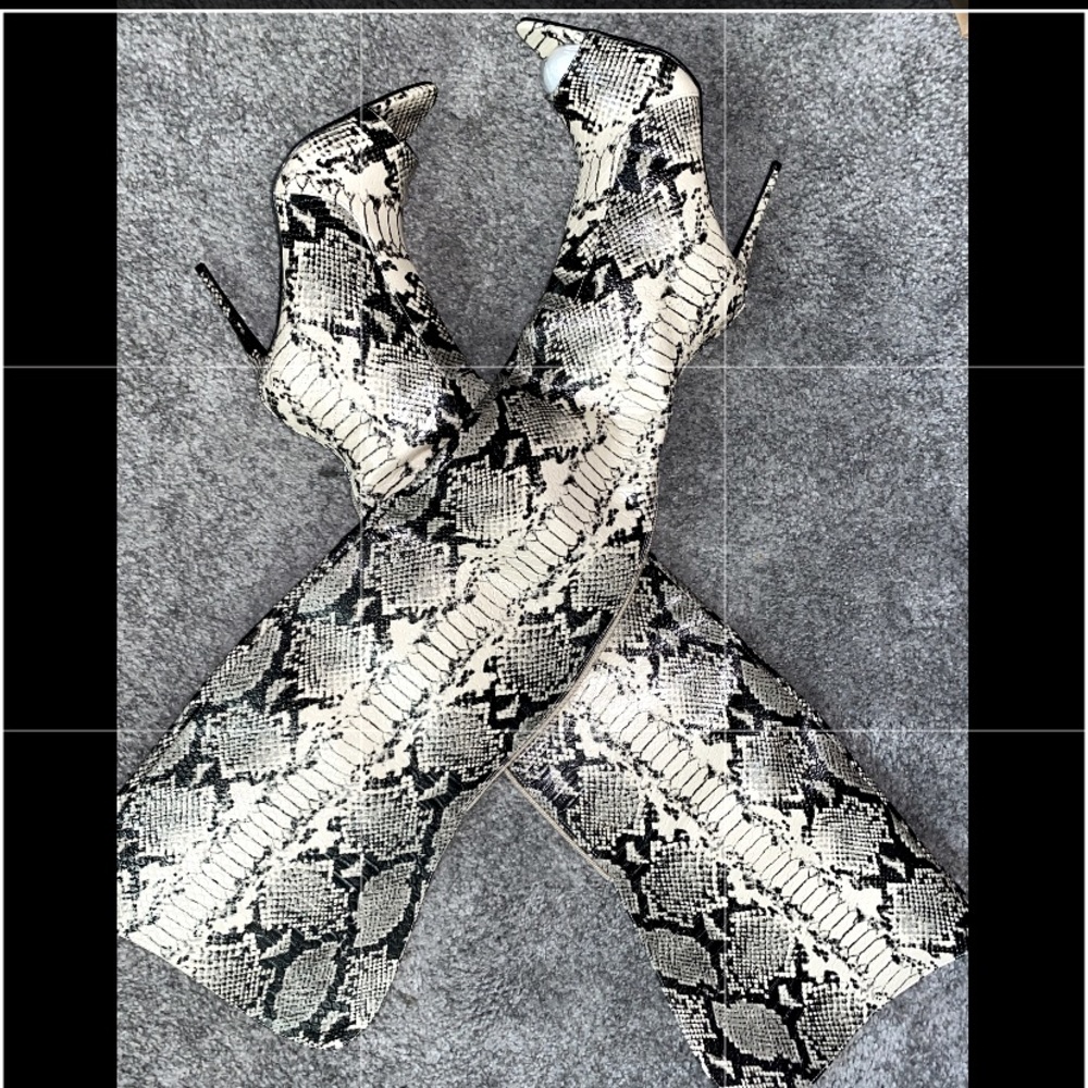 Snakeskin thigh high boots